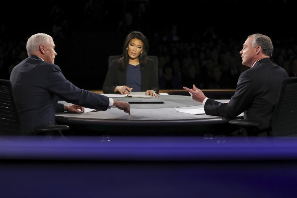 Republican vice-presidential nominee Gov. Mike Pence, left, and Democratic vice-presidential nominee Sen. Tim Kaine exchange opinions as Moderator Elaine Quijano of CBS News listens during the vice-presidential debate at Longwood University in Farmville, Va., Tuesday, Oct. 4, 2016. (Photo: Joe Raedle/Pool via AP)