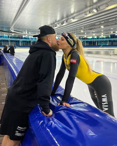 <p>Jutta Leerdam/Instagram</p> Jake Paul kisses Jutta Leerdam at an ice rink.