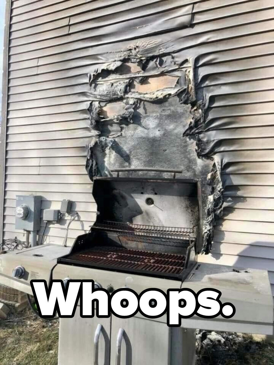 grilled that burned the siding of a house