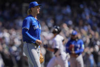 Toronto Blue Jays pitcher Bowden Francis reacts as New York Yankees' Giancarlo Stanton runs the bases after hitting a grand slam during the third inning of a baseball game Sunday, April 7, 2024, in New York. (AP Photo/Frank Franklin II)