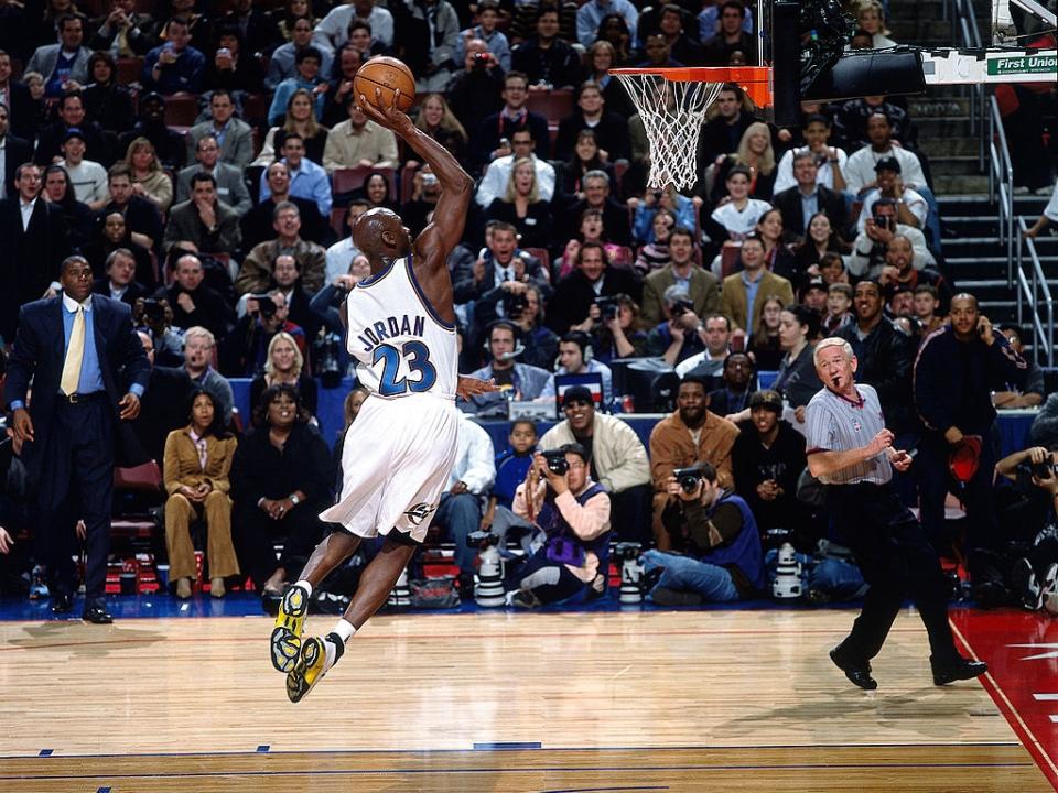 Michael Jordan attempts a dunk during the 2002 All-Star game circa 2002 in the First Union Center in Philadelphia, Pennsylvania.