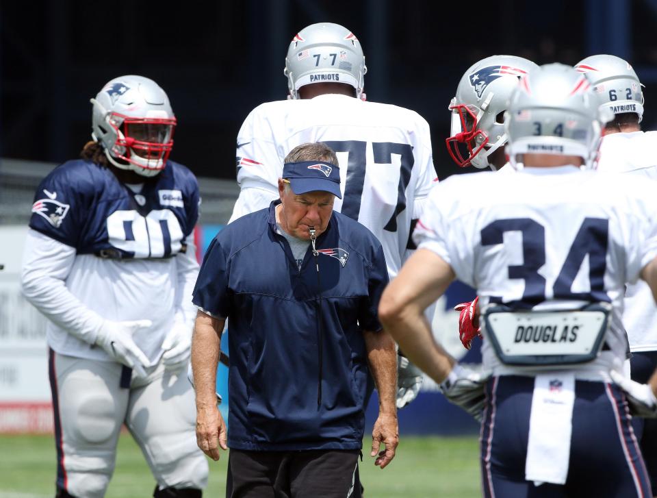 Patriots head coach Bill Belichick runs a practice during training camp in 2018.