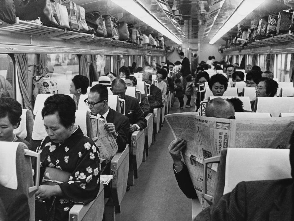 Passengers in the second-class coach of a Hikari Train in Japan, circa 1965.