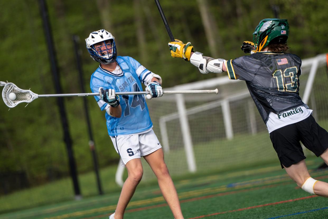 Apr 30, 2024; Denville, NJ, USA; Morris Knolls hosts Sparta in NJAC National boys lacrosse game on Tuesday afternoon. S#14 Stone Herbison and MK #13 Brian Crossan.