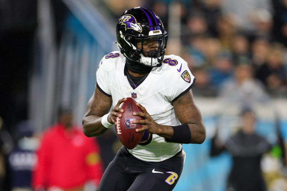 Dec 17, 2023; Jacksonville, Florida, USA; Baltimore Ravens quarterback Lamar Jackson (8) drops back to pass against the Jacksonville Jaguars in the first quarter at EverBank Stadium. Mandatory Credit: Nathan Ray Seebeck-USA TODAY Sports