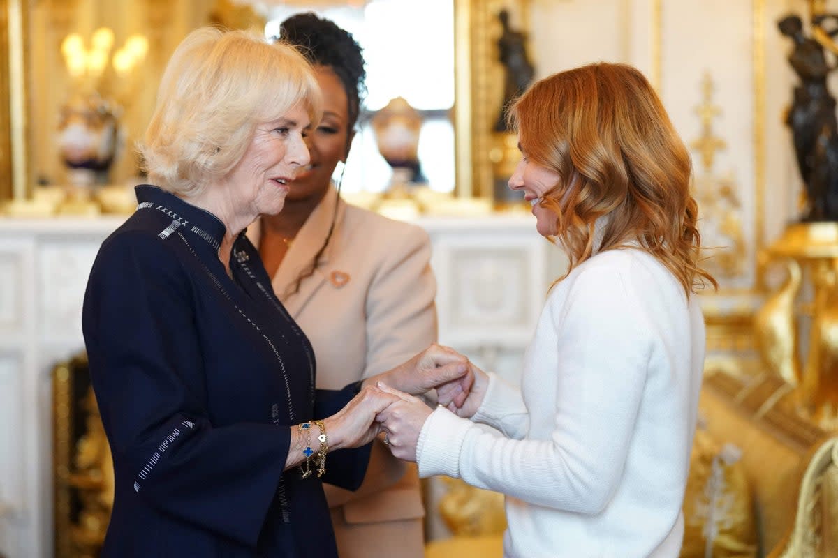 Camilla greets Geri Horner during the reception at Buckingham Palace (POOL/AFP via Getty Images)