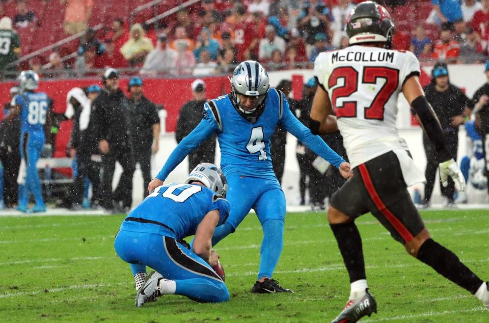 Dec 3, 2023; Tampa, Florida, USA; Carolina Panthers place kicker Eddy Pineiro (4) makes a field goal against the Tampa Bay Buccaneers during the first half at Raymond James Stadium. Mandatory Credit: Kim Klement Neitzel-USA TODAY Sports