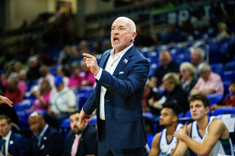 FGCU men's basketball coach Pat Chambers argues a call during a game against Lipscomb at Alico Arena on Thursday, Jan. 25, 2024.