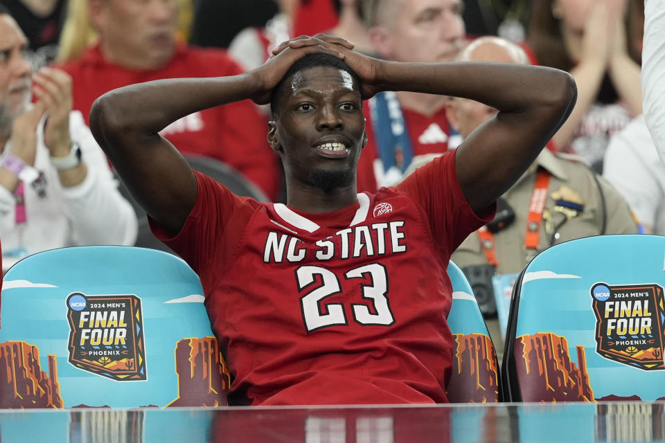 North Carolina State forward Mohamed Diarra (23) sits on the bench during the second half of the NCAA college basketball game against Purdue at the Final Four, Saturday, April 6, 2024, in Glendale, Ariz. (AP Photo/David J. Phillip)
