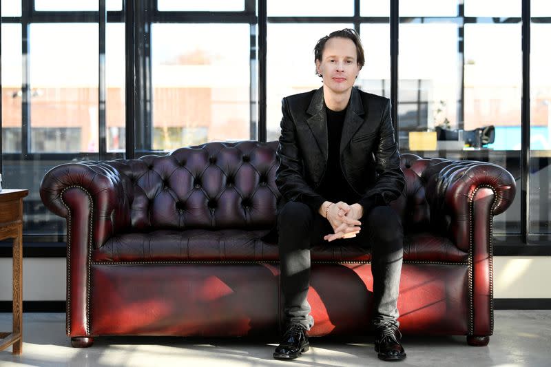 Dutch artist and designer Roosegaarde poses in his studio after an interview with Reuters in Rotterdam