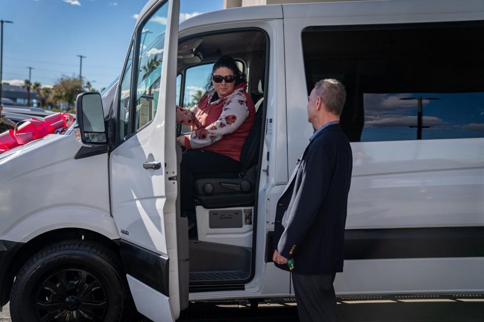 Karen Lopez and Tyler Corder on Jan./pp4, 2024. Corder works for Findlay Auto Group, who donated the van to Lopez after her husband Jerry Lopez, was killed during a carjacking on Dec./pp27, 2023a.