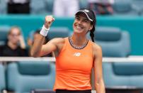 Sorana Cirstea of Romania reacts after defeating Aryna Sabalenka of Belarus during their match at the Miami Open tennis tournament on Wednesday, March 29, 2023, in Miami Gardens, Fla.