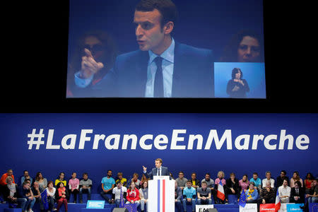 Emmanuel Macron, head of the political movement En Marche !, or Forward !, and candidate for the 2017 French presidential election, attends a political rally in Toulon, France February 18, 2017. REUTERS/Jean-Paul Pelissier