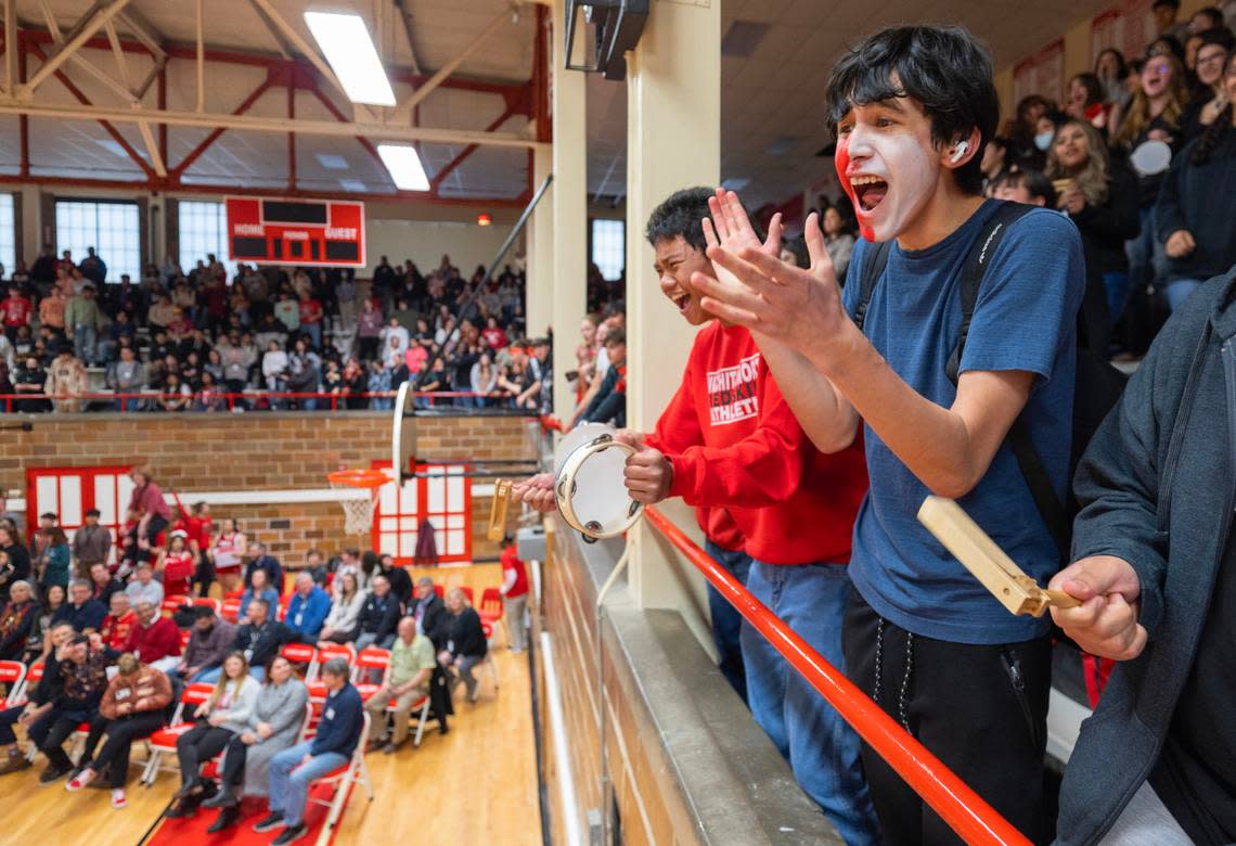 North High students cheer during a pep rally on Thursday where the new logo for the Redhawks name was unveiled.