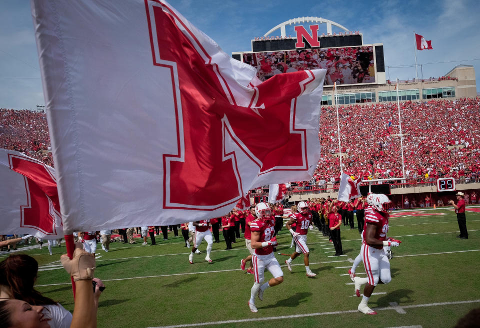 The Nebraska Cornhuskers take the field in 2015. (Photo by Eric Francis/Getty Images)