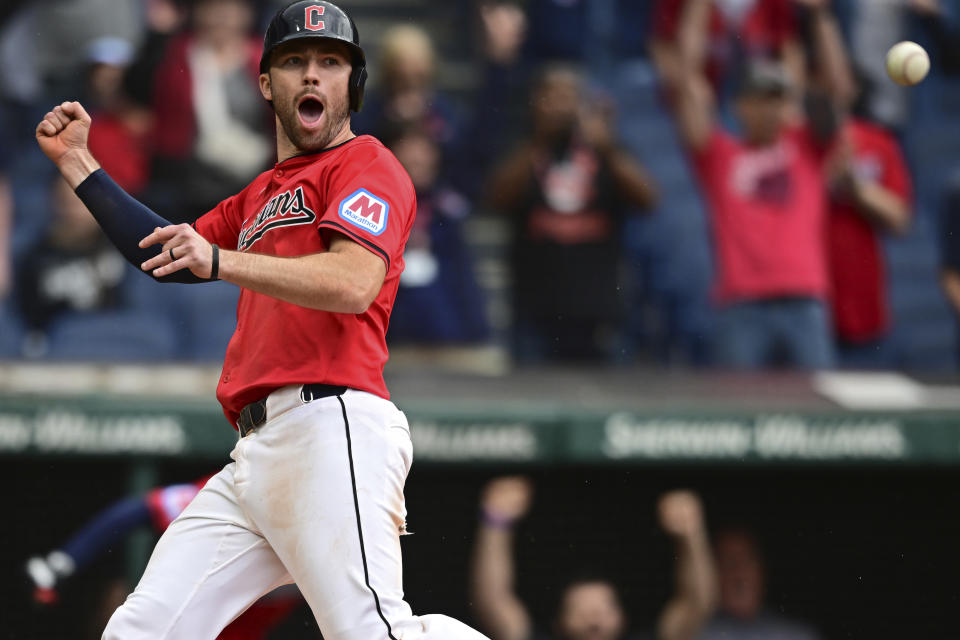 Cleveland Guardians' David Fry reacts after scoring the winning run on a sacrifice fly by Andres Gimenez in the 10th inning of a baseball game against the New York Yankees, Sunday, April 14, 2024, in Cleveland. (AP Photo/David Dermer)