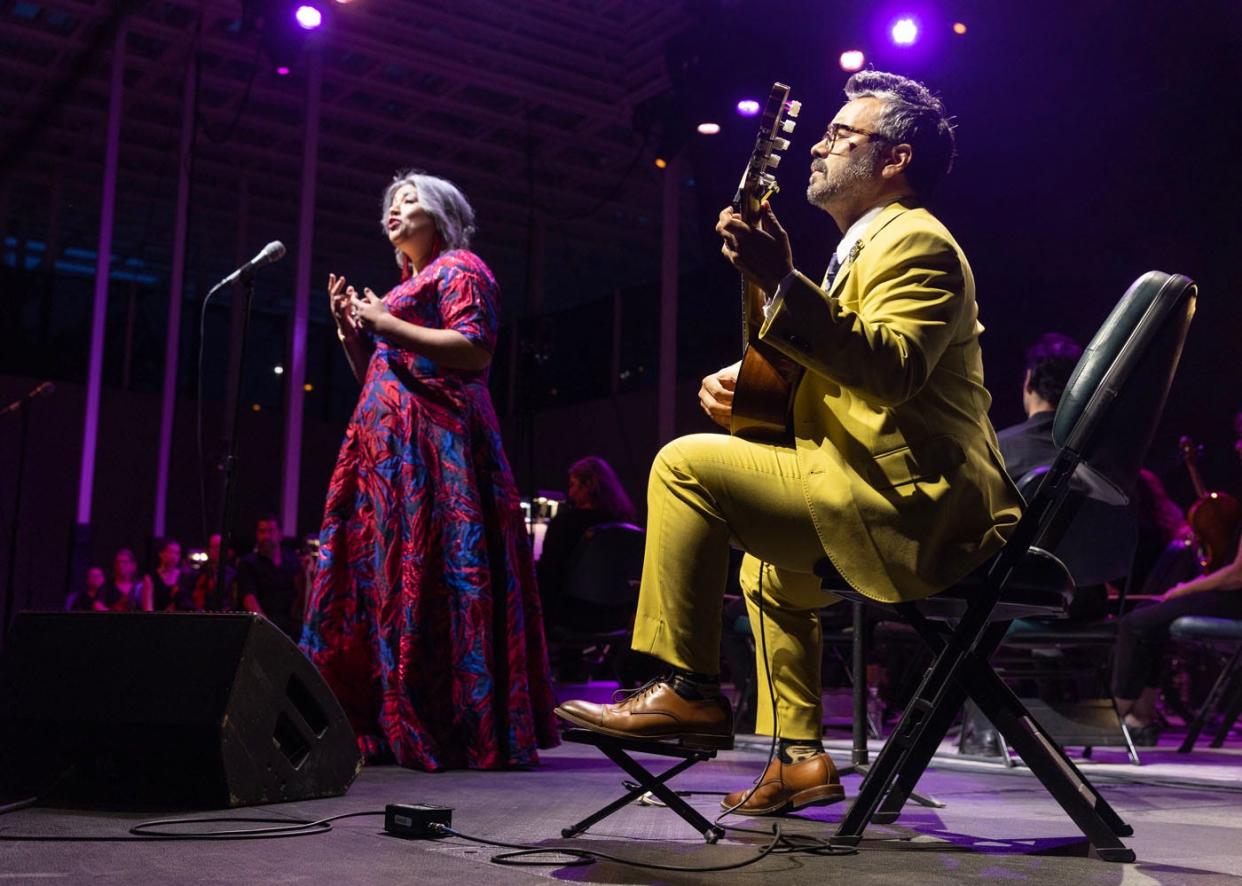 Mezzo-soprano Claudia Chapa sings with classical guitarist Arnold Yzaguirre during "Bella Noche de Música," staged by Austin Opera at the Moody Amphitheater in Waterloo Park.