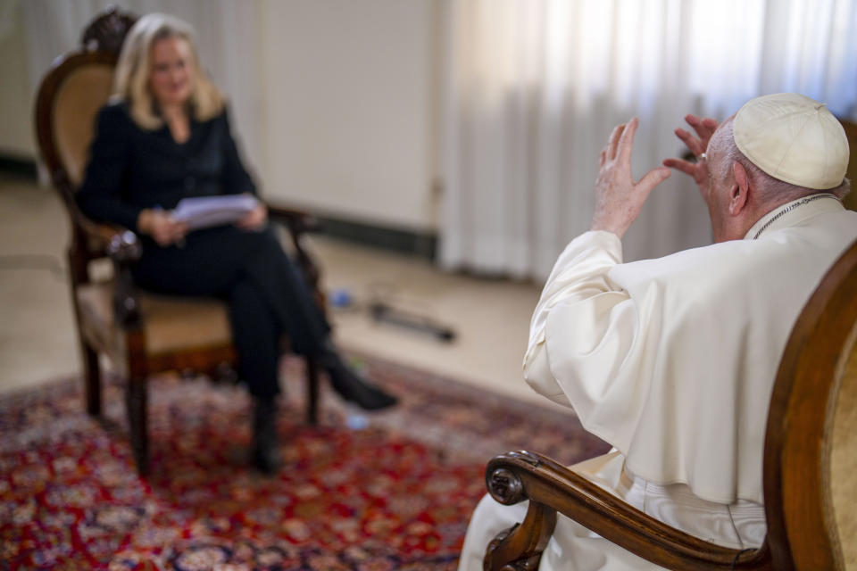 Pope Francis speaks during an interview with The Associated Press at The Vatican, Tuesday, Jan. 24, 2023. According to the pope, the arms industry has brought untold death and destruction to the world. “The world is obsessed with weapons,” he said. (AP Photo/Domenico Stinellis)