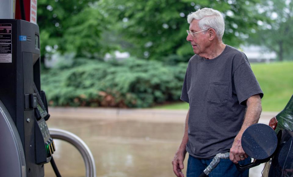 Fred Totter of Loves Park pumps gas on Wednesday, June 8, 2022, at Woodman's Gas & Lube Center, 3205 McFarland Rd., in Rockford in Rockford.