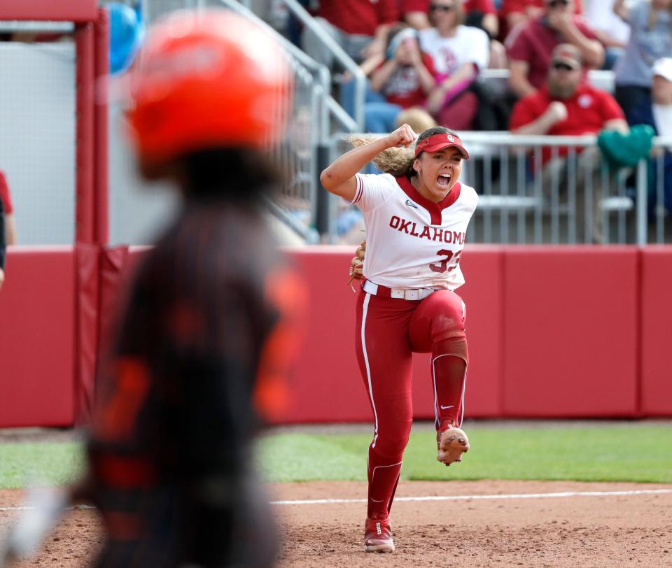Oklahoma's Alyssa Brito (33) celebrates a strike out in the seventh inning during the Bedlam college softball game between the University of Oklahoma Sooners and the Oklahoma State University Cowgirls at Love's Field in Norman, Okla., Sunday, May, 5, 2024.
