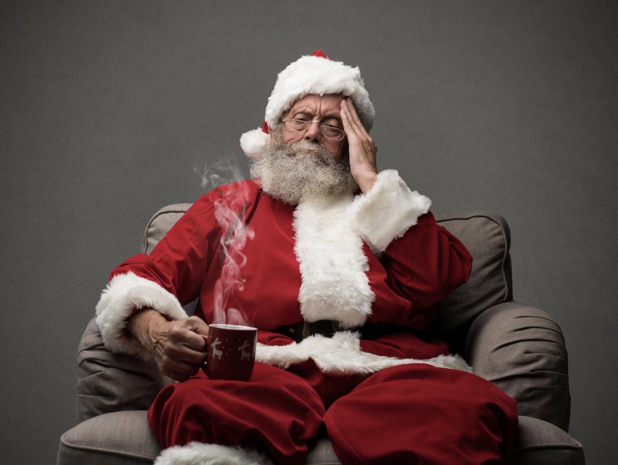 Even Santa can get worn out, which can lead to getting the blues. <a href="https://www.shutterstock.com/image-photo/sad-santa-claus-having-headache-on-758492533?src=cg-yLMqvCXdSdx9uS_V3YA-1-30" rel="nofollow noopener" target="_blank" data-ylk="slk:Stokkete;elm:context_link;itc:0;sec:content-canvas" class="link ">Stokkete</a>