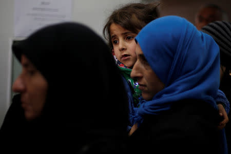 People wait in line inside The Children's Hospital in Damascus, Syria February 20, 2017. Picture taken February 20, 2017. REUTERS/Omar Sanadiki