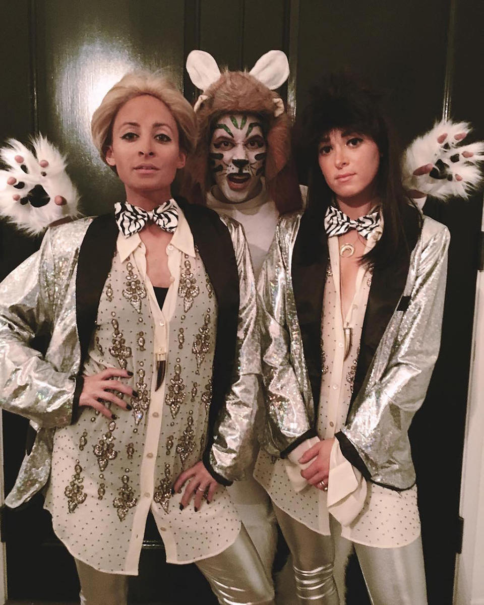 <p>Richie and a couple of friends channeled legendary animal trainers/illusionists Siegfried and Roy, as well as one of their white tigers — most likely Montecore, who attacked Roy back in 2003. (Photo: <a rel="nofollow noopener" href="https://www.instagram.com/p/BMIf0TsgX_S/?taken-by=nicolerichie" target="_blank" data-ylk="slk:Instagram;elm:context_link;itc:0;sec:content-canvas" class="link ">Instagram</a>) </p>