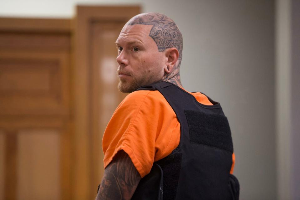 Adam Curtis Williams appears in court at Kleberg County Courthouse on Friday, Nov. 8, 2019. His shaved head revealed an array of tattoos, some profanity-laced.