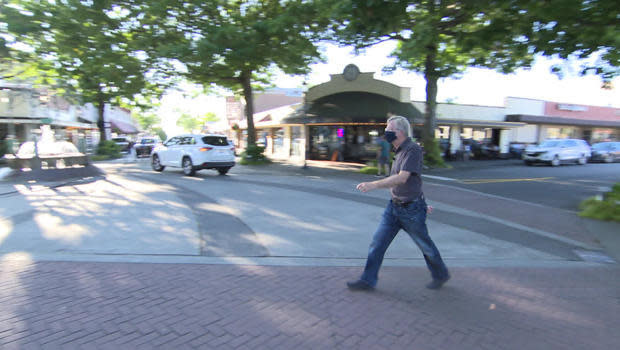 Rick Steves strolls the streets of Edmonds, Wash., 5,650 miles from Rome.  / Credit: CBS News