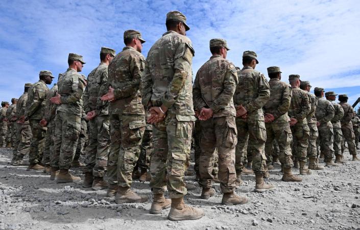 U.S. soldiers stand to attention at the United States Army military training base in Germany on July 13, 2022. <a href="https://www.gettyimages.com/detail/news-photo/soldiers-stand-to-attention-at-the-united-states-army-news-photo/1241877321?adppopup=true" rel="nofollow noopener" target="_blank" data-ylk="slk:Christof Stache/AFP via Getty Images" class="link ">Christof Stache/AFP via Getty Images</a>
