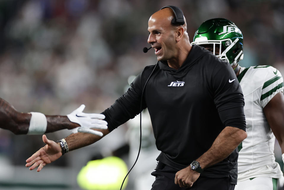 New York Jets head coach Robert Saleh congratulates safety Jordan Whitehead (3) after Whitehead intercepted a pass in the end zone agains the Buffalo Bills during the third quarter of an NFL football game, Monday, Sept. 11, 2023, in East Rutherford, N.J. (AP Photo/Adam Hunger)