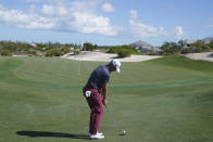 Justin Thomas, of the United States, chips onto the fourth green during the final round of the Hero World Challenge PGA Tour at the Albany Golf Club, in New Providence, Bahamas, Sunday, Dec. 5, 2021.(AP Photo/Fernando Llano)