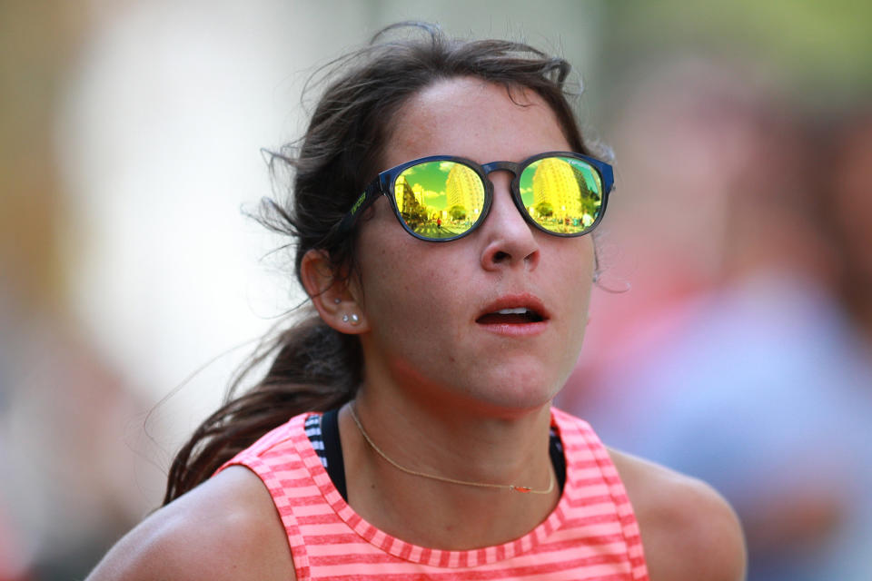 The road ahead reflects in the sunglasses of a runner during the 2019 New York City Marathon. (Photo: Gordon Donovan/Yahoo News)