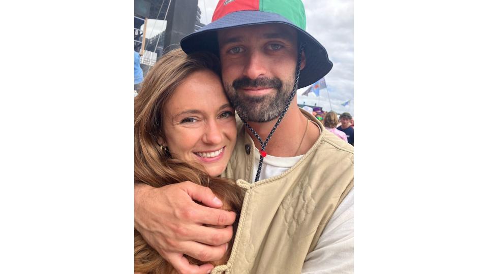 couple hugging at music festival 