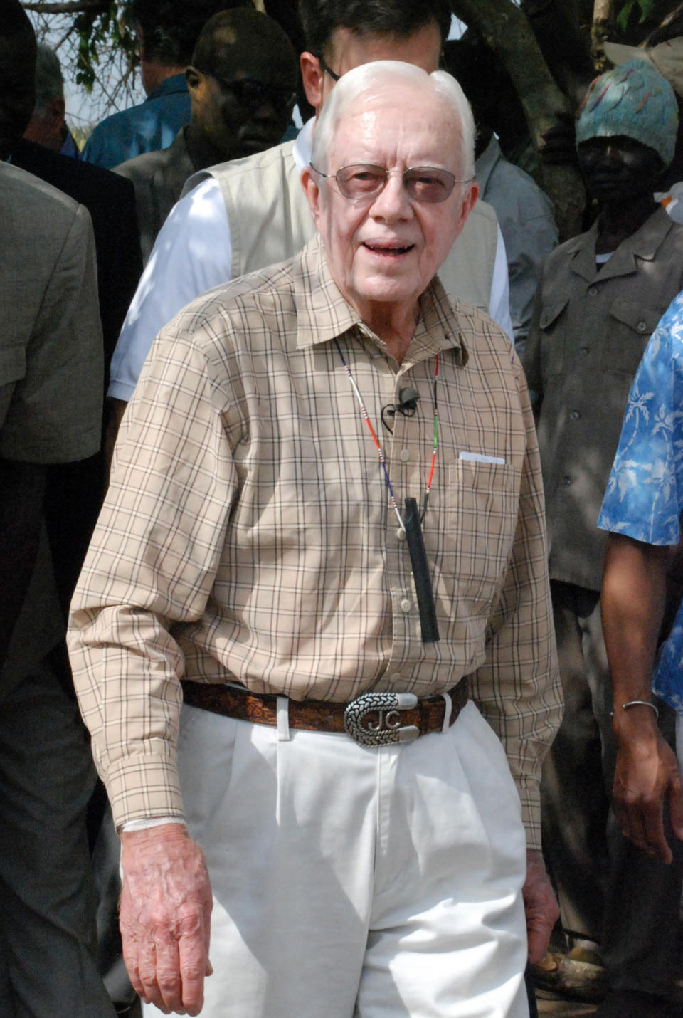 Former U.S. president Jimmy Carter visits the Sudanese village of Lojura -- one of the world's worst areas for Guinea worm -- on&nbsp;Feb. 11, 2010. The Carter Centre has been working in Sudan since 1989 to eradicate it. (Photo: PETER MARTELL/AFP/Getty Images)