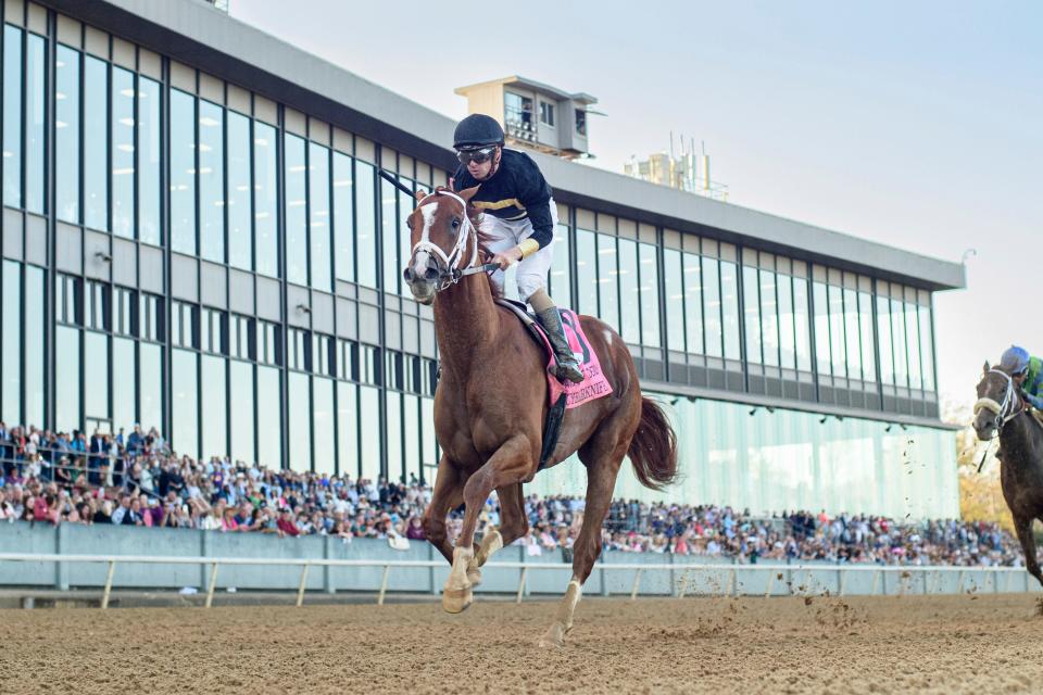 Cyberknife, ridden by jockey Florent Geroux, wins the Arkansas Derby (Grade I) at Oaklawn Racing Casino Resort in Hot Springs, Arkansas on April 2, 2022.