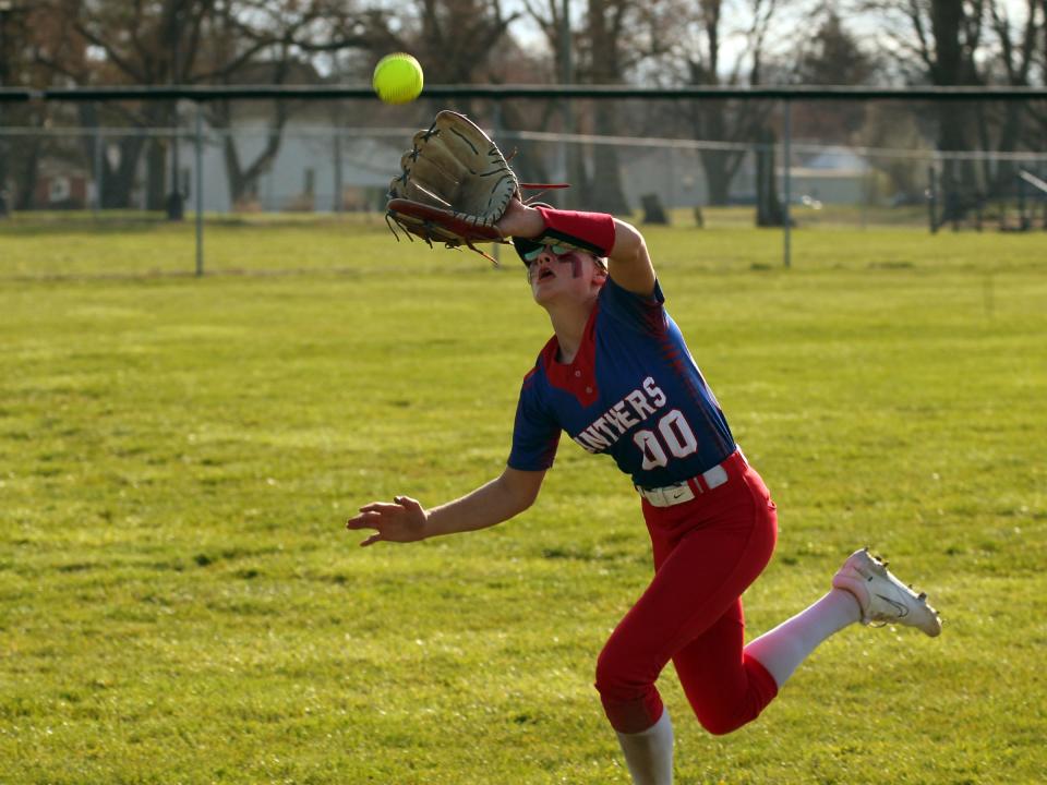 Licking Valley's Sylvie Devore catches a popup during a game against Newark Catholic last season. Licking Valley will have a remote learning day because of Monday's solar eclipse, and all extracurricular activities have been moved to Tuesday.