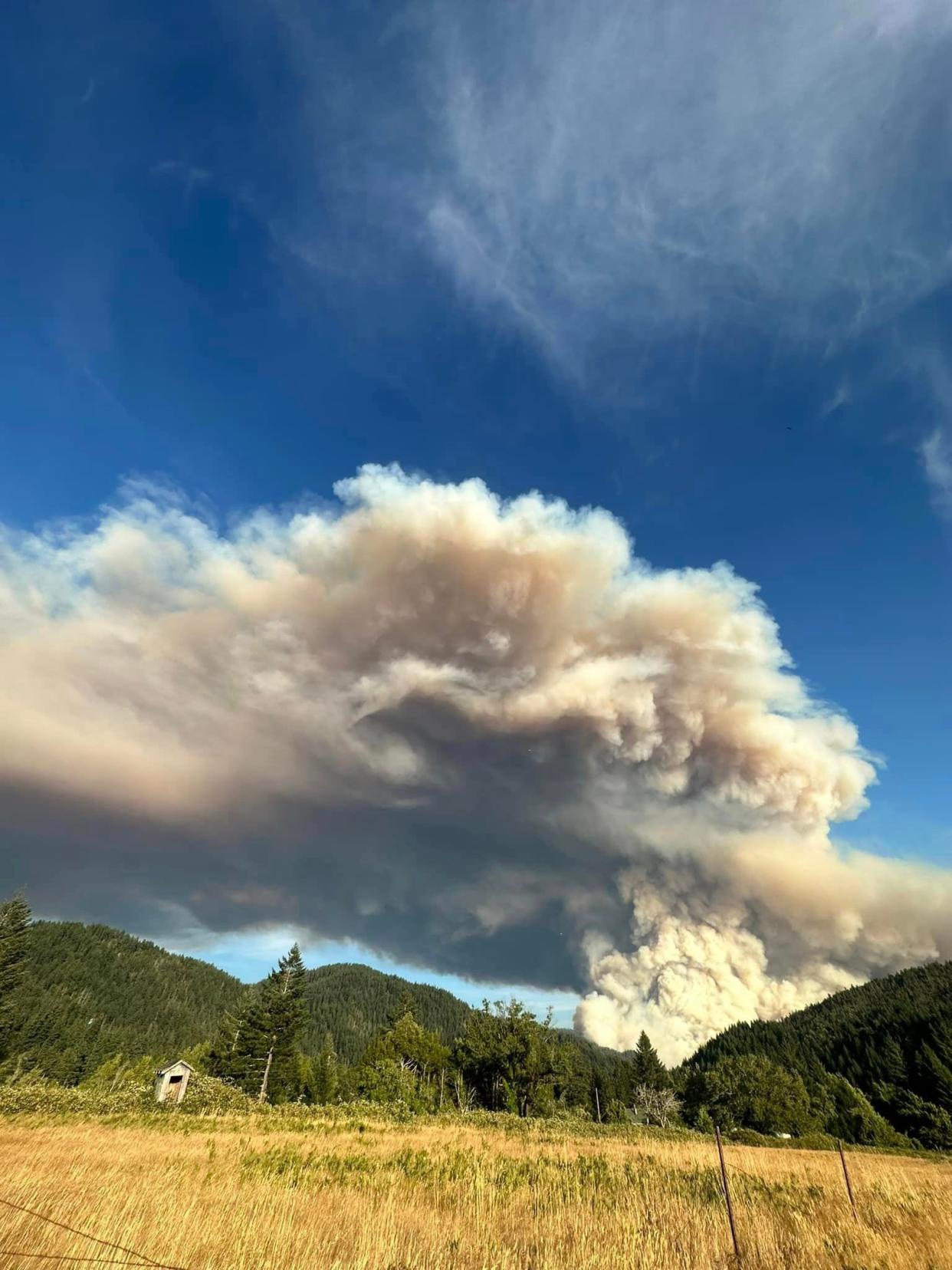 The Flat Fire in southwest Oregon east of Gold Beach burned more than 34,000 acres near Agness and Gold Beach.