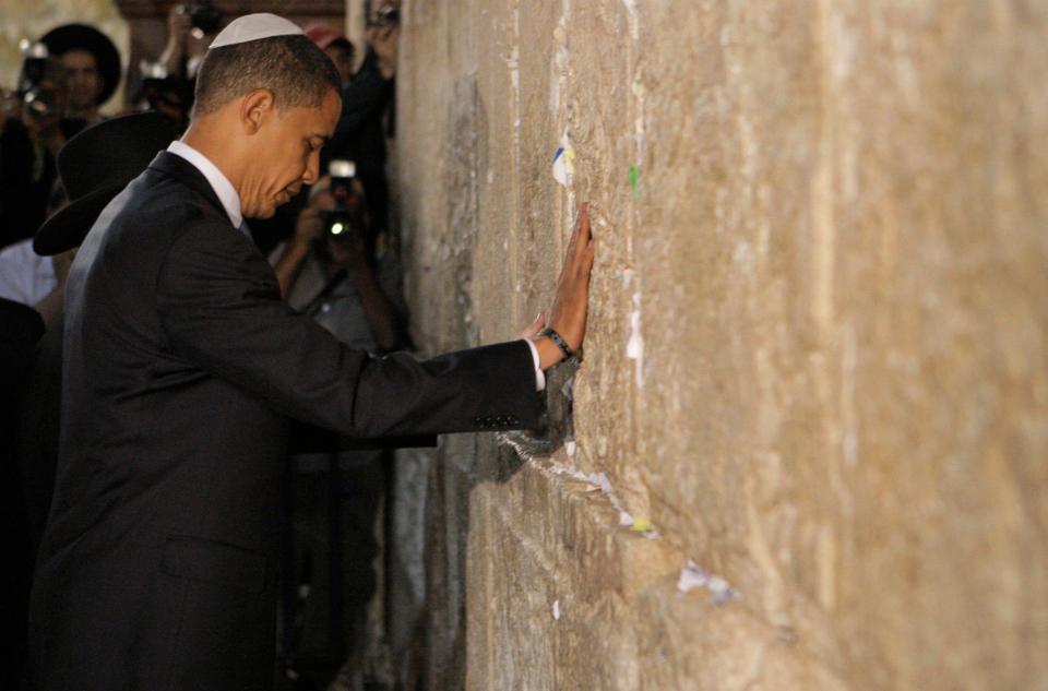 US Democratic presidential candidate Sen. Barack Obama, D-Ill., prays at the Western Wall in Jerusalem, Thursday, July 24, 2008. Obama has professed "an unshakable commitment to the security" of Israel, whether the threat comes from terrorists, Iran or elsewhere.  