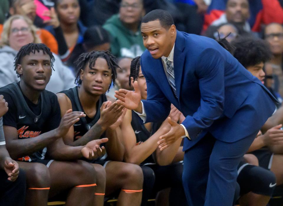 Manual coach Marvin Jordan works the bench during a game against Richwoods earlier this season. The Rams won the consolation championship at the 2023 Pontiac Holiday Tournament.