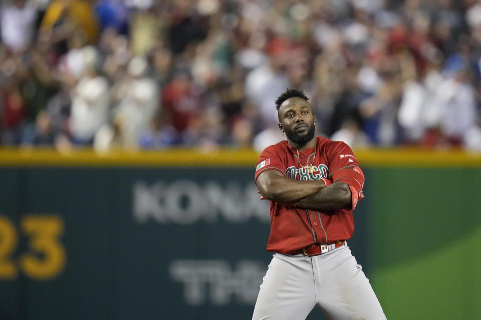 Mexico's Randy Arozarena celebrates after hitting an RBI-double against the United States during the fourth inning of a World Baseball Classic game in Phoenix, Sunday, March 12, 2023. (AP Photo/Godofredo A. Vásquez)