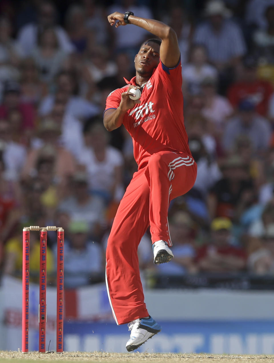 England's Chris Jordan bowls during their the T20 International cricket match against West Indies at the Kensington Oval in Bridgetown, Barbados, Thursday, March 13, 2014. (AP Photo/Ricardo Mazalan)