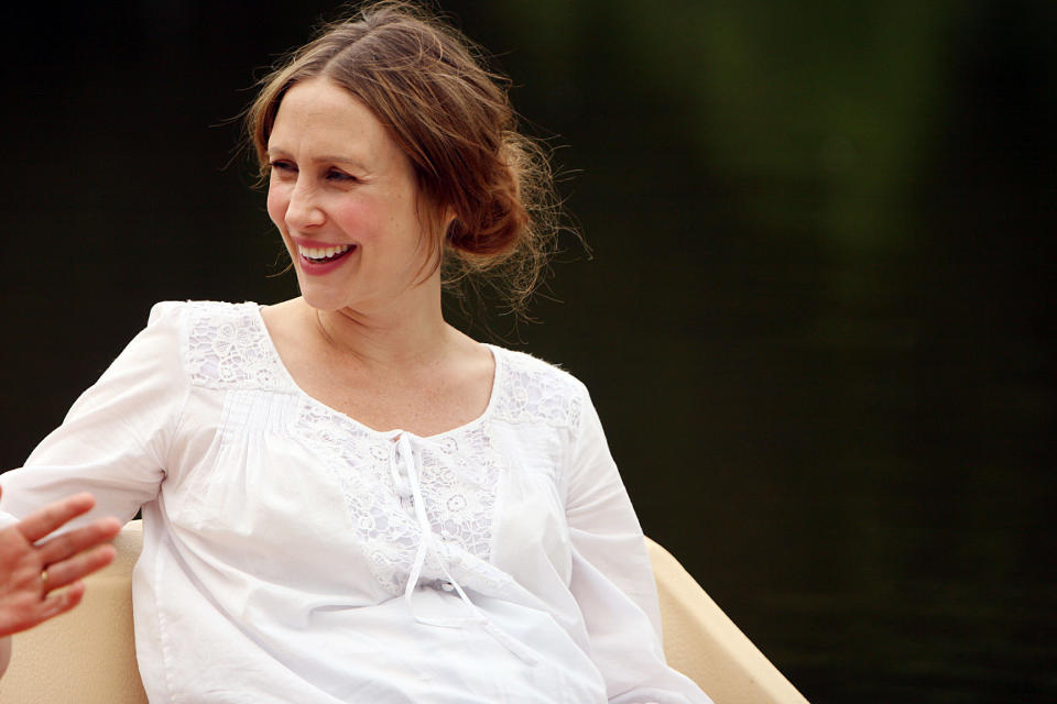 Vera Farmiga wears a white dress