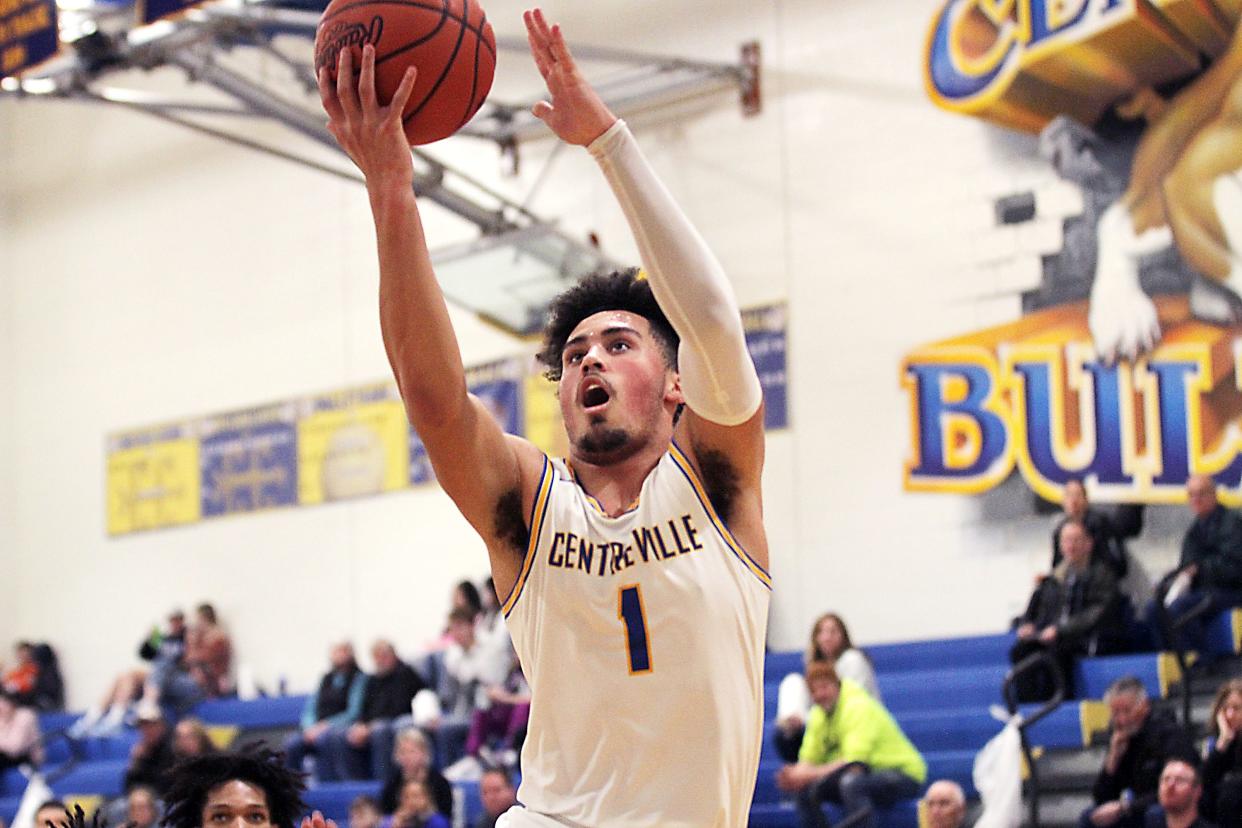 Roman Robinson soars in to score two points for Centreville against Comstock on Tuesday.