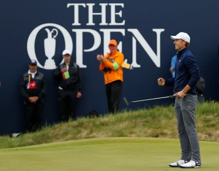 USA’s Jordan Spieth celebrates after holing a putt on the 18th green to win The Open Championship REUTERS/Andrew Boyers