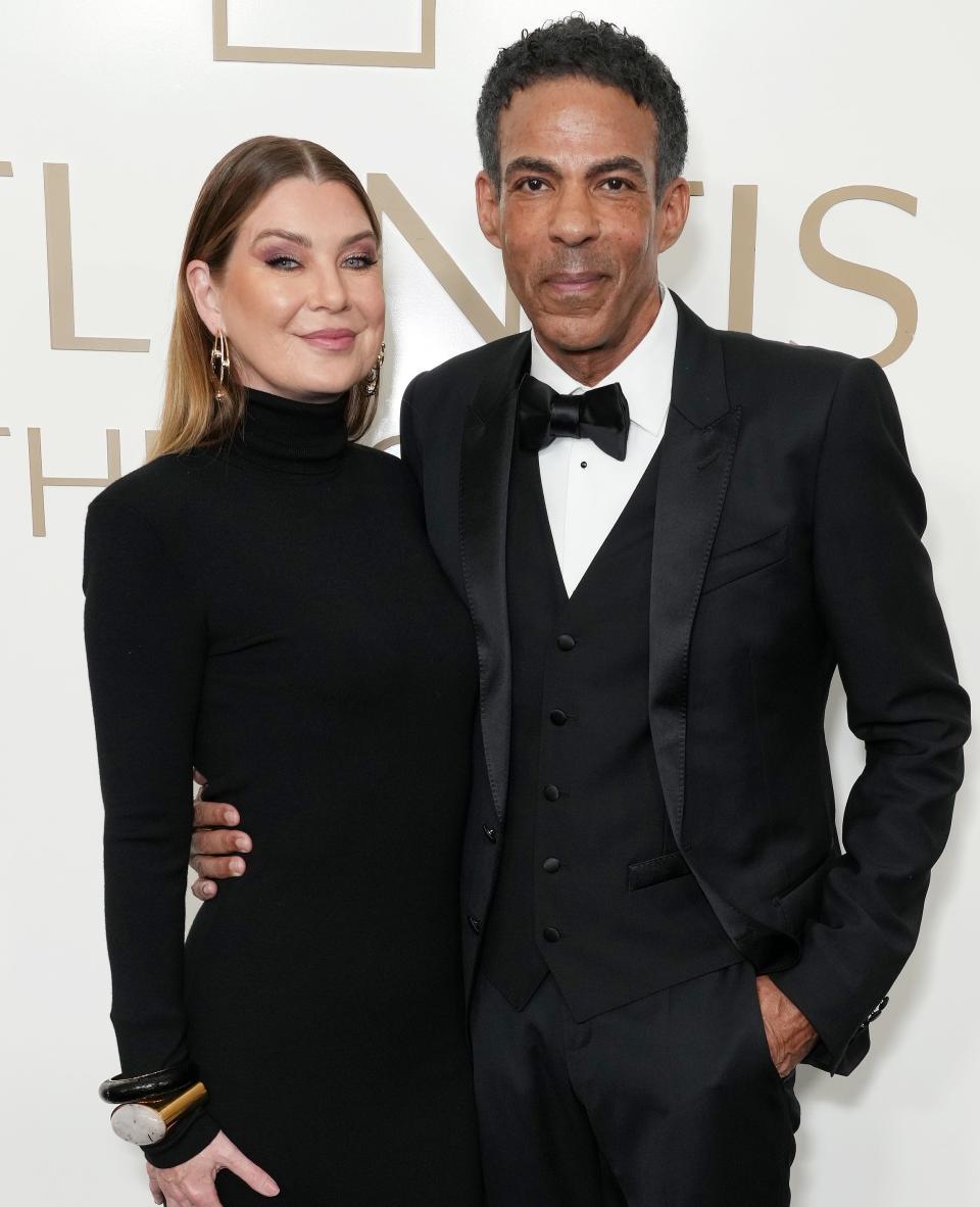 Close-up of Ellen and Chris at a press event