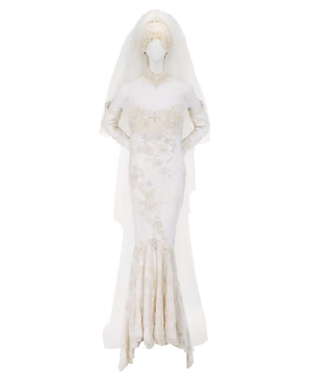 Houston's wedding dress she wore in 1992 is up for auction.