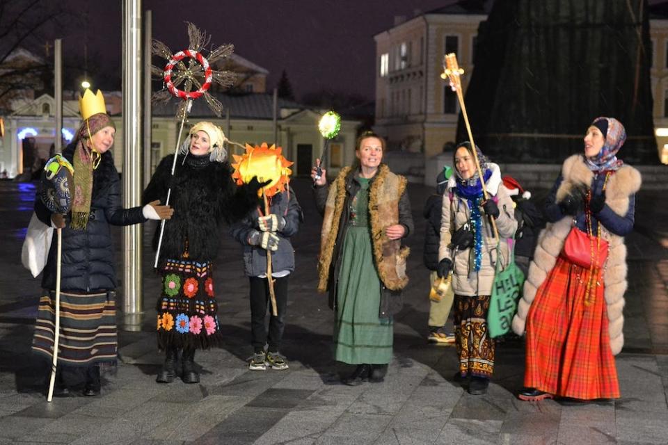 Student singers in Kharkiv perform carols in one of the main Kharkiv's squares on December 24, 2023 in Kharkiv, Ukraine.