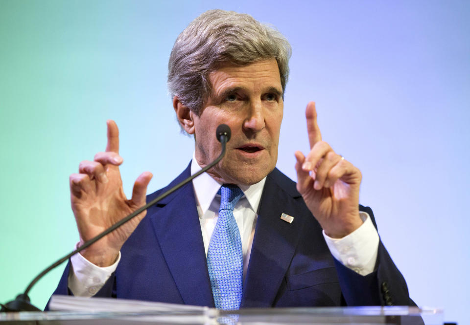 Secretary of State John Kerry gestures during a speech on climate change on Sunday, Feb. 16, 2014, in Jakarta. Climate change may be the world's "most fearsome" weapon of mass destruction and urgent global action is needed to combat it, Kerry said on Sunday, comparing those who deny its existence or question its causes to people who insist the Earth is flat. (AP Photo/ Evan Vucci, Pool)