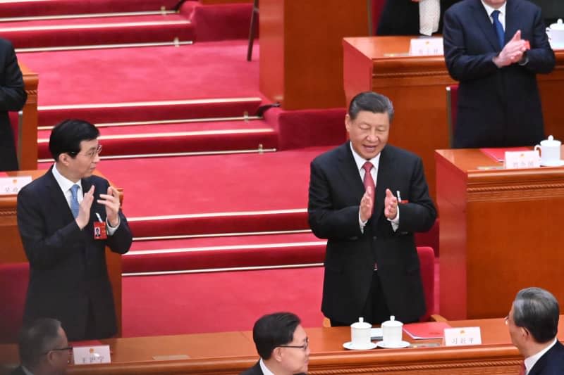 Chinese President Xi Jinping attends the closing meeting of the second session of the 14th National People's Congress (NPC) at the Great Hall of the People in Beijing. Johannes Neudecker/dpa